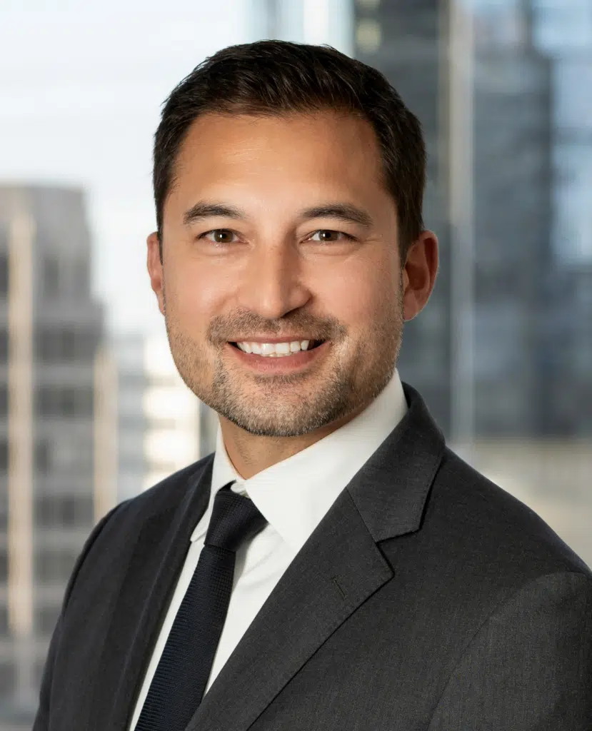 Professional headshot of Chandler Udo, Partner at Oslund Udo Little