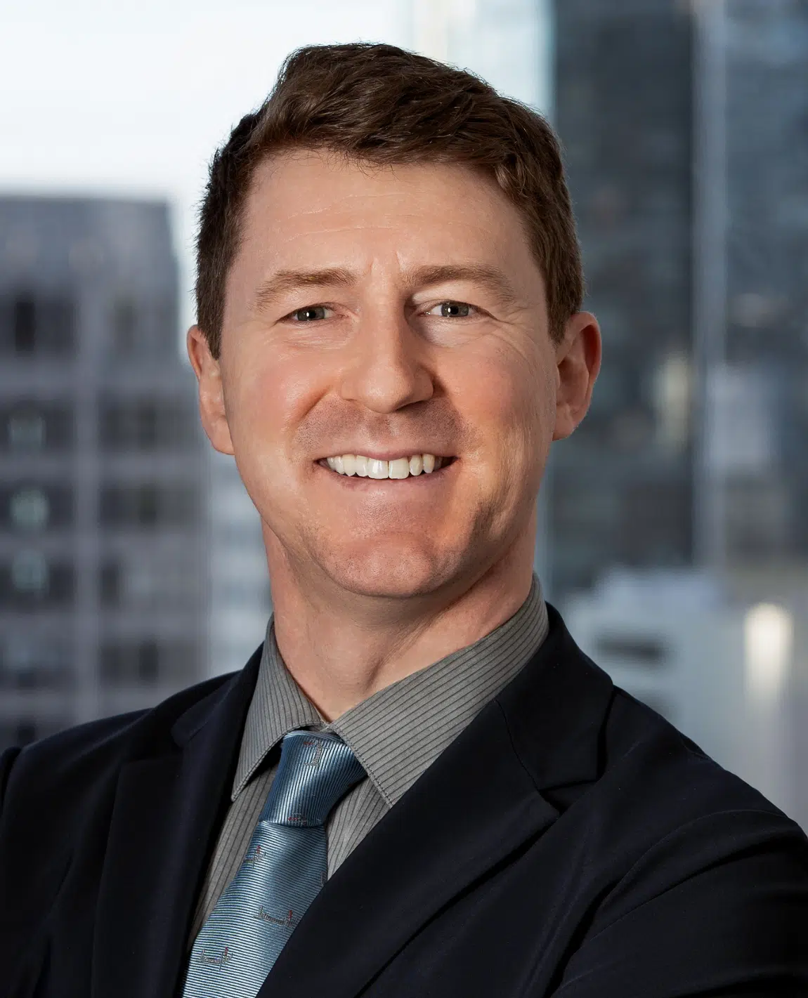 Professional headshot of Myles Crandall, Associate Attorney at Oslund Udo Little