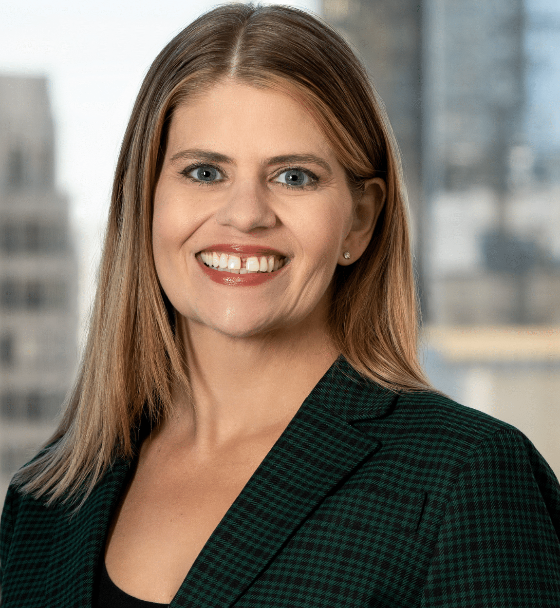 Professional headshot of Vanessa Firnhaber Oslund, Partner and Asbestos/Sexual Abuse Lawyer