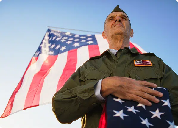 veteran holding flag