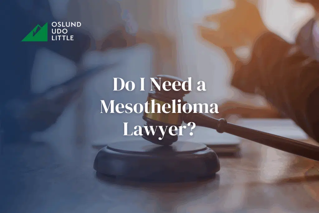 Do I Need a Mesothelioma Lawyer? A gavel is in focus while two people talk in the background
