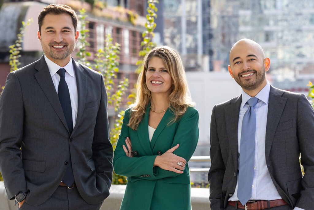 A team photo the partners at Oslund Udo Little who focus on mesothelioma law, asbestos exposure litigation, and sexual abuse survivors
